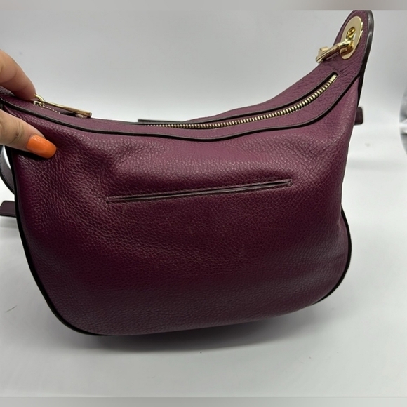 Micheal Kors Plum Pebbled Leather Grommet Strap Hobo EUC - Picture 3 of 5